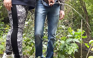 MILF in leggings helps a stranger pee by the lake
